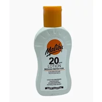 White Malibu Lotion SPF 20 bottle with orange cap and logo, 200ml, medium protection.