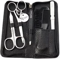 Black leather case with silver scissors, tweezers, nail file, comb, and trimmer by Alpen.