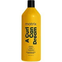 Yellow Matrix A Curl Can Dream Shampoo bottle, 1000ml, with bold black text and black cap.