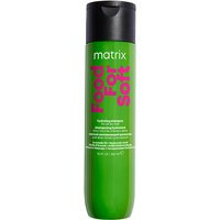 Green Matrix shampoo bottle with black cap, pink text, infused with avocado oil and hyaluronic acid.