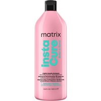 Pink Matrix Instacure Build a Bond Conditioner bottle, 1000ml, with black cap and bold turquoise text.