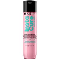 Pink Matrix Instacure Build-A-Bond Mighty Bonds Shampoo bottle, 300ml, with black cap and teal text.