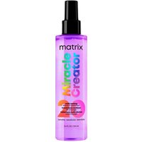 Purple Matrix Miracle Creator 20 Leave-In Treatment bottle with black spray nozzle and colorful text.