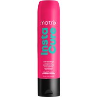 Pink Matrix Total Results InstaCure Anti-Breakage Conditioner bottle with black cap and teal text.
