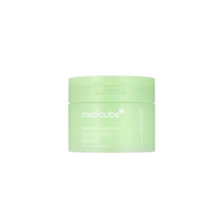 Green medicube Exosome Cica Calming Pad container with white text, round shape, 150ml capacity.