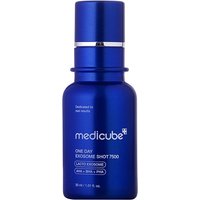 Blue Medicube serum bottle with silver accents, labeled "One Day Exosome Shot Pore Ampoule 7500," 30 ml size.