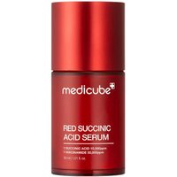 Red Medicube serum bottle with white text, featuring a cylindrical shape and a matching red cap.