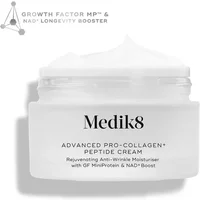 Medik8 Advanced Pro-Collagen+ Peptide Cream in a frosted jar with white lid, featuring black text and smooth cream inside.