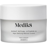 White jar of Medik8 Intelligent Retinol Smoothing Night Cream with silver lid and black text.