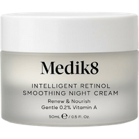 Medik8 Intelligent Retinol Soothing Night Cream in a frosted jar with a white lid, 50 ml, sleek and minimalist design.