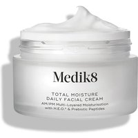 Clear jar of Medik8 Total Moisture Daily Facial Cream with white lid and creamy texture visible inside.