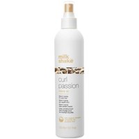 White bottle of milk_shake Curl Passion Leave In, 300ml, with gold spray nozzle and brown text accents.