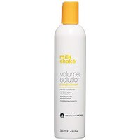 White bottle of milk_shake Volume Solution Conditioner with yellow cap and logo, 300ml size.