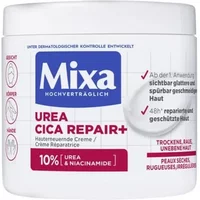 Mixa Urea Cica Repair Plus cream in a white 400ml tub with blue logo and red text detailing urea and niacinamide benefits.