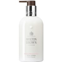White Molton Brown body lotion bottle with black pump, silver collar, and logo text, 300 ml size for men.
