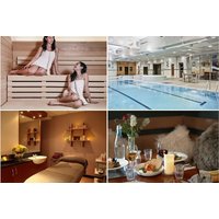 Spa day package with Elemis treatments, indoor pool, sauna, massage room, and dining setup with candles and drinks.