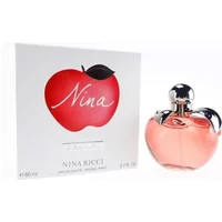 Nina Ricci Nina Eau De Toilette 80ml, apple-shaped pink bottle with silver cap, next to white box with red apple design.
