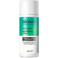 White Nioxin Age Defense Conditioner bottle, 50 ml, with green label and black text detailing active-renewal formula.