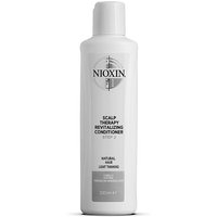 White Nioxin System 1 conditioner bottle with gray cap, black text, and circular logo for natural hair revitalization.