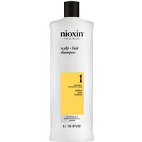 White Nioxin Systems Shampoo bottle, System 1, 1000ml, with black cap and yellow label detailing.