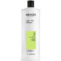 White Nioxin Systems Shampoo bottle, System 2, 1000ml, black cap, green label detailing for natural hair.