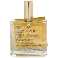 Square glass bottle of Nuxe Huile Prodigieuse Dry Oil with gold cap and label detailing in black text.