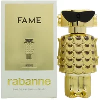 Gold Paco Rabanne Fame Intense Eau De Parfum 50ml bottle shaped like a robot with a black mask and scalloped design.