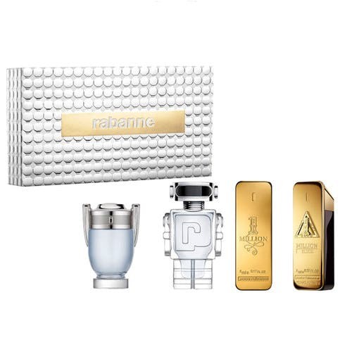 Silver hexagonal box with a gold logo, containing three mini fragrances: a clear bottle shaped like a trophy, a robot-shaped bottle, and two gold rectangular bottles.
