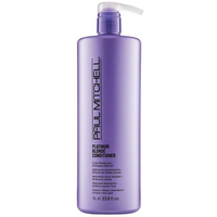 Purple Paul Mitchell Platinum Blonde Conditioner 1000ml bottle with pump dispenser and black text.