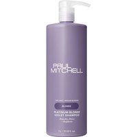 Paul Mitchell Platinum Blonde Violet Shampoo 1000ml in a tall lavender pump bottle with white text.