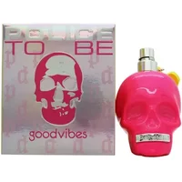 Pink skull-shaped Police To Be GoodVibes perfume bottle with silver cap, next to matching branded box.