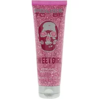 Pink tube of Police To Be Sweet Girl Body Lotion 100ml with skull design and glittery background.