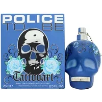 Blue skull-shaped bottle with floral designs, next to matching box labeled "Police To Be Tattooart Eau De Toilette 75ml".