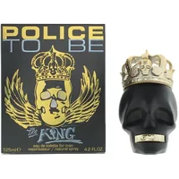 Black skull-shaped bottle with a gold crown, next to a box labeled "Police To Be The King" in gold and black.