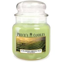 Calming Green Tea scented candle in a clear glass jar with a domed lid, featuring a green tea field label.