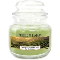 Small jar candle with green wax, labeled "Calming Green Tea" by Price's Candles, featuring a scenic tea field image.