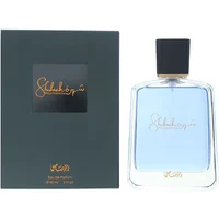 Rasasi Shuhrah Pour Homme Eau De Parfum 90ml, clear bottle with blue liquid, black cap, black box with gold lettering.