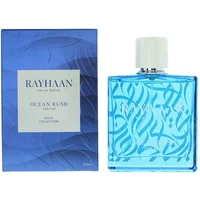 Rayhaan Ocean Rush Eau De Parfum 100ml, blue square bottle with white cap, intricate wave design, blue box packaging.