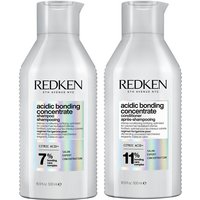 Redken Acidic Bonding Concentrate Shampoo and Conditioner in white bottles with holographic accents, 500ml each.