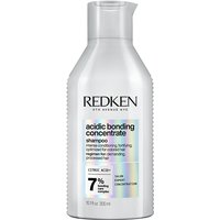 Redken Acidic Bonding Concentrate Shampoo in a white bottle with a flip-top cap and holographic label accents.