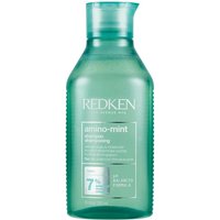Translucent green bottle of Redken Amino-Mint Scalp Shampoo, 300ml, with flip-top cap and white text.