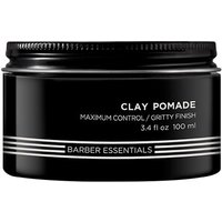 Black Redken Brews Clay Pomade jar, 100ml, with white text and striped design on the label.