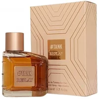 Rectangular amber perfume bottle with bronze cap, labeled "#TANK Replay," next to matching geometric patterned box.