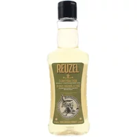 Clear bottle of Reuzel Tea Tree 3-In-1 Shampoo 350ml with black cap and green label featuring vintage design.