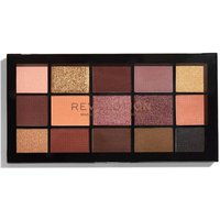 Makeup palette with 15 shades in pink, gold, and brown tones, housed in a black rectangular case.