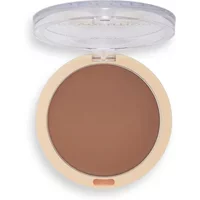 Revolution Ultra Cream Bronzer Light in a round beige compact with a clear lid.