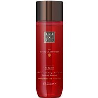 Red Rituals Ayurveda shower oil bottle with gold cap, 200ml, featuring white text and a small orange emblem.