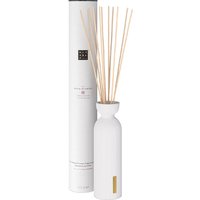 White Rituals Sakura fragrance sticks in an elegant white bottle with gold label and matching cylindrical packaging.