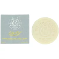 Roger & Gallet Cologne Twist Cleansing Bar 100g, round beige soap with embossed logo, next to gray box packaging.