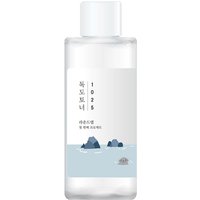 Clear Round Lab 1025 Dokdo Toner bottle with white cap, minimalist label featuring blue sea and island illustration.